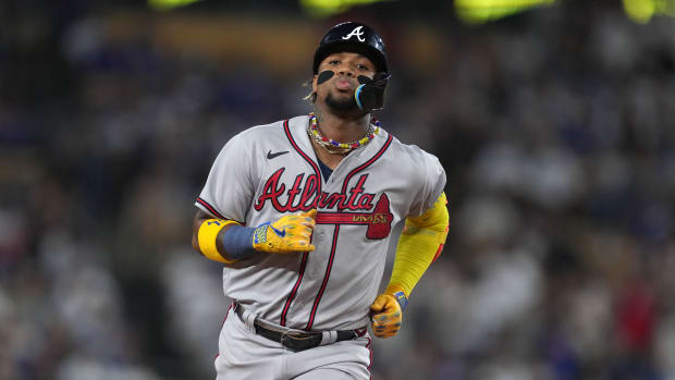 Aug 31, 2023; Los Angeles, California, USA; Atlanta Braves right fielder Ronald Acuna Jr. (13) runs the bases after hitting a grand slam home run in the second inning against the Los Angeles Dodger at Dodger Stadium.