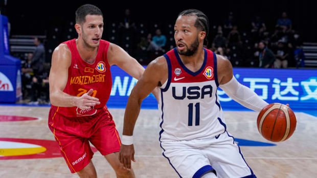 U.S. guard Jalen Brunson drives against Montenegro guard Nikola Ivanovic during a FIBA World Cup game on Sept. 1, 2023.