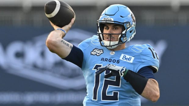 Toronto Argonauts quarterback Chad Kelly throws a pass in a CFL game.