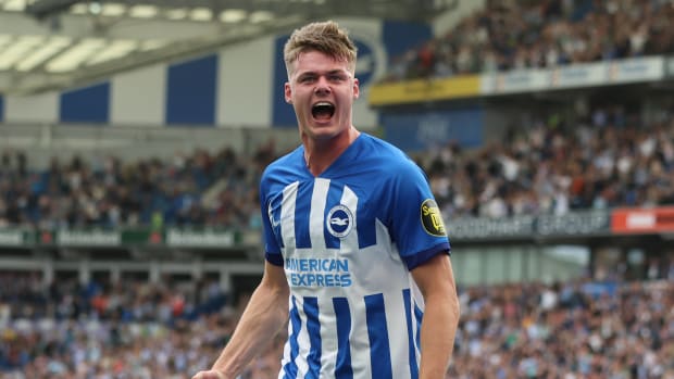 Evan Ferguson pictured celebrating a goal for Brighton during the 2023/24 Premier League season