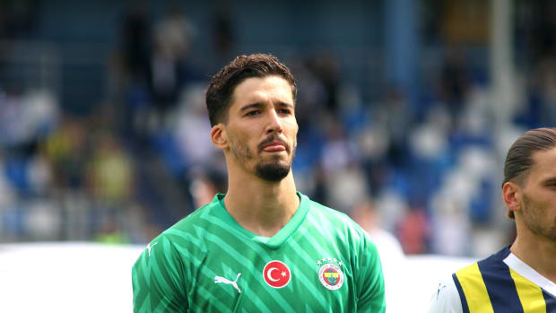 Goalkeeper Altay Bayindir pictured lining up before playing for Fenerbahce against Neftci Baku in July 2023