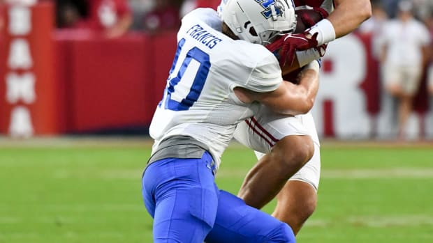 Middle Tennessee Blue Raiders linebacker Drew Francis (10) tackles Alabama Crimson Tide tight end CJ Dippre (81) during the first half at Bryant-Denny Stadium.