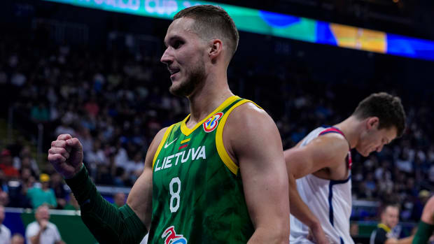 Lithuania forward Tadas Sedekerskis (8) celebrates after a foul by U.S. center Walker Kessler (14) during the first half of a Basketball World Cup second-round match in Manila, Philippines.