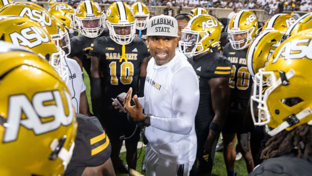 Alabama State Head Coach Eddie Robinson leading his team during Labor Day Classic Against Southern