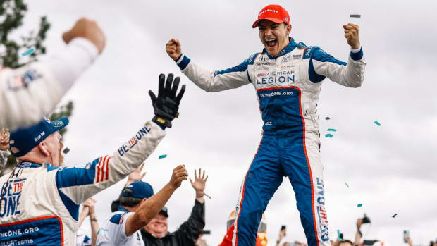 Alex Palou celebrates after winning his second IndyCar championship in the last three seasons. IndyCar photo by Joe Skibinski.