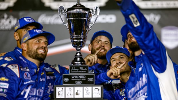 It's selfie time as Kyle Larson and several of his team members crowd around for a self-portrait after Larson won the opening race in the NASCAR Cup playoffs Sunday at Darlington Raceway. Photo: Getty Images for NASCAR.