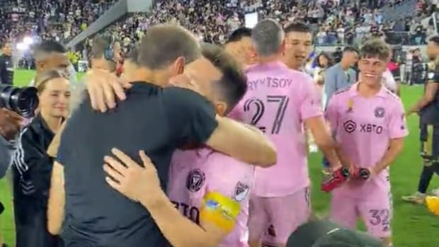 Giorgio Chiellini (left) and Lionel Messi pictured sharing a hug after Messi had posed for a photo with Chiellini's eight-year-old daughter Nina following Inter Miami's 3-1 win over LAFC in September 2023