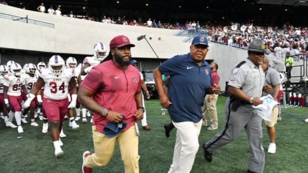 South Carolina State head coach Buddy Pough running out during the MEAC/SWAC Challenge against Jackson State.