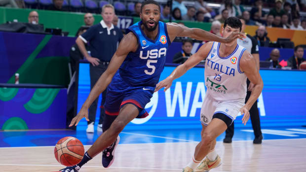 U.S. forward Mikal Bridges drives past Italy forward Simone Fontecchio at the FIBA World Cup on Sept. 5, 2023.