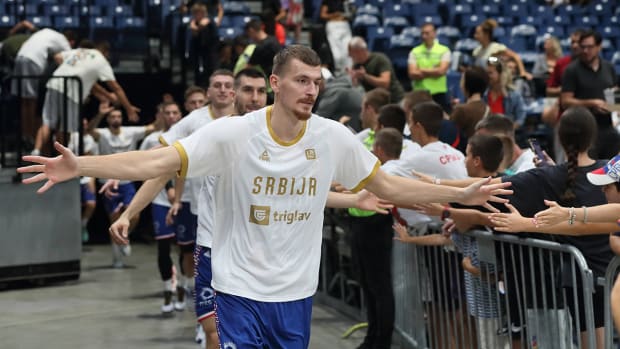 Boriša Simanić, a power forward on the Serbian national team, enters the court before a game in the FIBA World Cup.