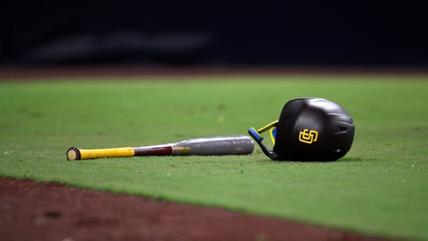Aug 22, 2023; San Diego, California, USA; A detailed view of a San Diego Padres helmet and bat in the field during the seventh inning against the Miami Marlins at Petco Park.