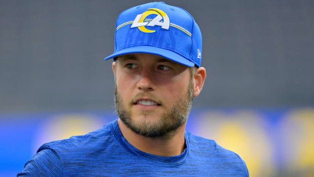 Rams quarterback Matthew Stafford stands on the sidelines during a preseason game.