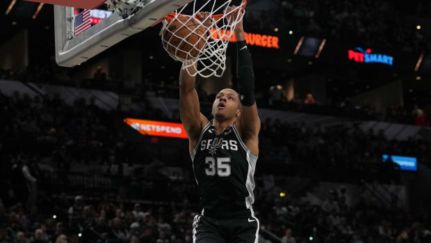 San Antonio Spurs guard Romeo Langford (35) dunks in the first half against the Atlanta Hawks at the AT&T Center.