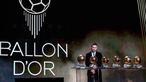 Lionel Messi with his Ballon d’Or awards
