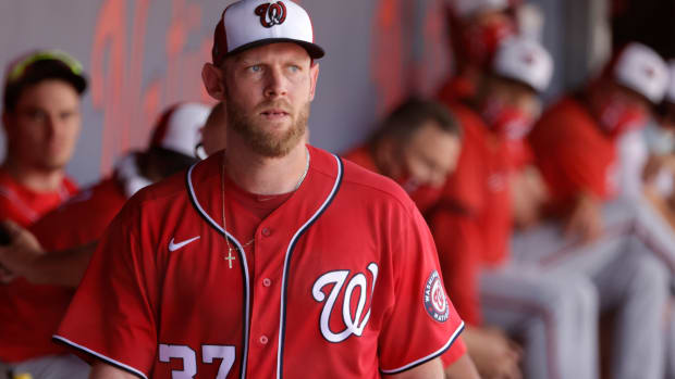 Mar 14, 2021; West Palm Beach, Florida, USA; Washington Nationals pitcher Stephen Strasburg (37) walks out of the dugout after leaving during the third inning of a spring training game against the Houston Astros at FITTEAM Ballpark of the Palm Beaches. Mandatory Credit: Rhona Wise-USA TODAY Sports  