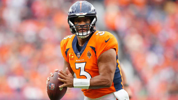 Denver Broncos quarterback Russell Wilson (3) prepares to pass to wide receiver Courtland Sutton (14) (not pictured) who scored a touchdown in the second quarter against the Las Vegas Raiders at Empower Field at Mile High.