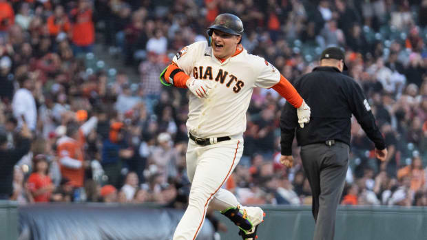SF Giants DH Joc Pederson (23) reacts after hitting a solo home run against the Colorado Rockies at Oracle Park (2023).