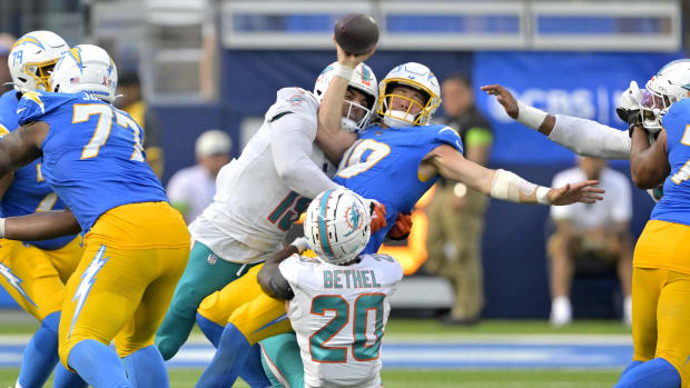 Dolphins linebacker Jaelan Phillips and cornerback Justin Betchel sack Chargers quarterback Justin Herbert to preserve Miami's 36-34 victory in Week 1.