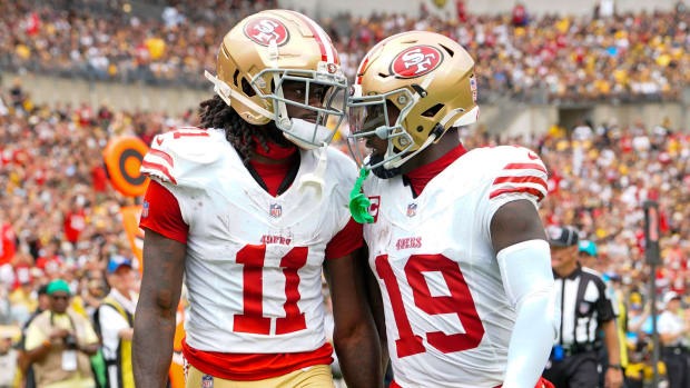 49ers wide receiver Deebo Samuel, right, congratulates teammate Brandon Aiyuk for catching a touchdown in Week 1 win over Steelers