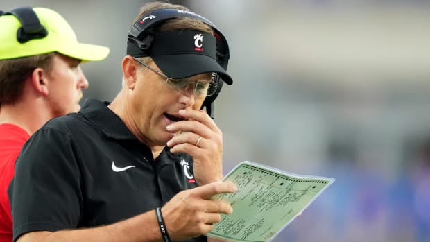 Cincinnati Bearcats head coach Scott Satterfield calls a play in the second quarter of a college football game between the Cincinnati Bearcats at the Pittsburgh Panthers, Saturday, Sept. 9, 2023, at Acrisure Stadium in Pittsburgh, Pa.