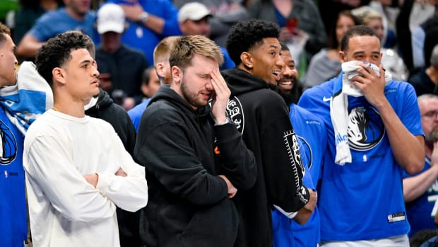 Luka Doncic sits out of a game between the Mavericks and Bulls on April 7.