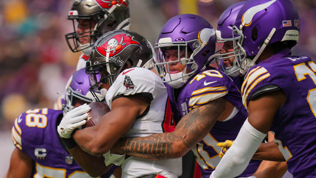 Sep 10, 2023; Minneapolis, Minnesota, USA; Tampa Bay Buccaneers running back Sean Tucker (44) is tackled by Minnesota Vikings linebacker Ivan Pace Jr. (40) in the second quarter at U.S. Bank Stadium. Mandatory Credit: Brad Rempel-USA TODAY Sports
