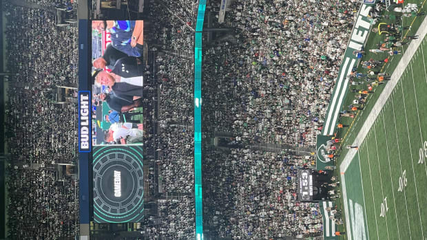 A packed MetLife Stadium with Jake Paul on the videoboard