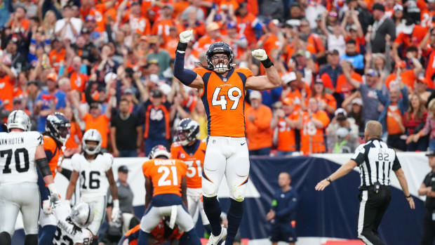 Denver Broncos linebacker Alex Singleton (49) reacts to his turnover in the third quarter against the Las Vegas Raiders at Empower Field at Mile High.
