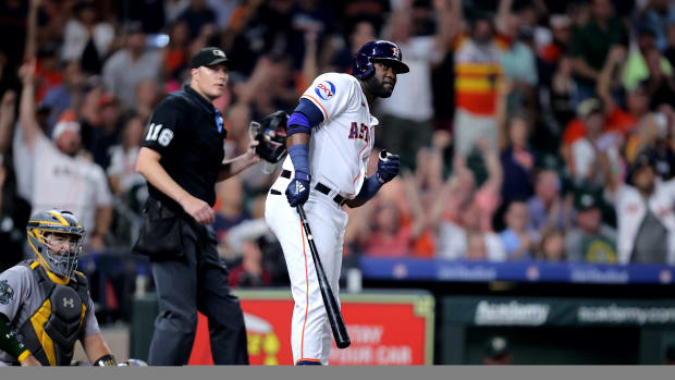 Sep 13, 2023; Houston, Texas, USA; Houston Astros left fielder Yordan Alvarez (44) reacts after hitting a three-run home run to right field against the Oakland Athletics during the third inning at Minute Maid Park.