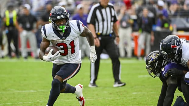 Sep 10, 2023; Baltimore, Maryland, USA; Houston Texans running back Dameon Pierce (31) carries the ball against the Baltimore Ravens during the second half at M&T Bank Stadium.