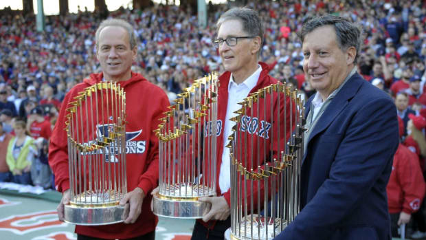 Boston Red Sox owners John Henry, Larry Lucchino, Tom Werner