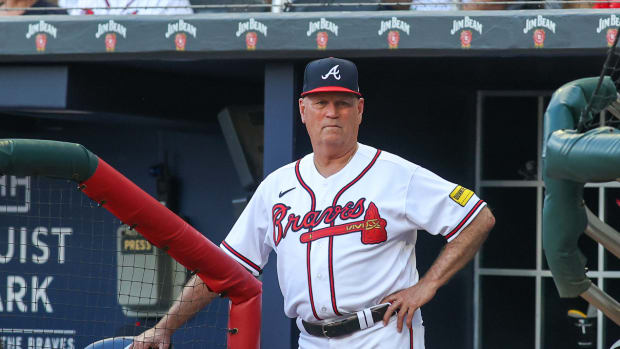 Jun 26, 2023; Atlanta, Georgia, USA; Atlanta Braves manager Brian Snitker (43) in the dugout against the Minnesota Twins in the first inning at Truist Park.