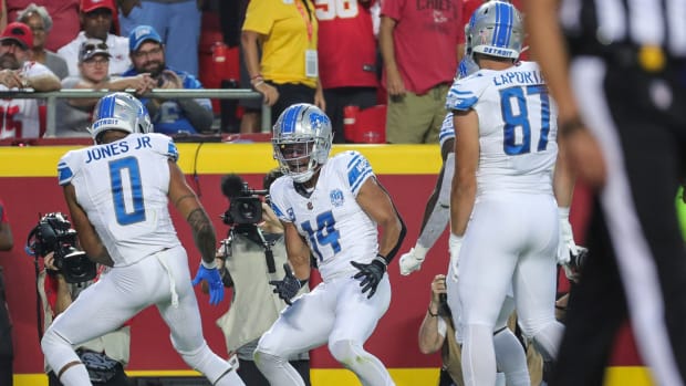 Lions wide receiver Amon-Ra St. Brown celebrates scoring during Detroit's 21-20 win over the Chiefs on Sept. 7, 2023.