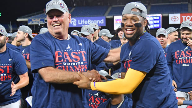 Sep 13, 2023; Philadelphia, Pennsylvania, USA; Atlanta Braves manager Brian Snitker (43) and right fielder Ronald Acuna Jr. (13) celebrate their 6th straight Nagtional league East title with win against the Philadelphia Phillies at Citizens Bank Park.