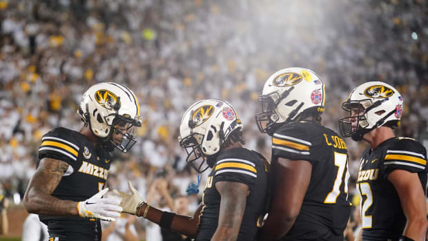 Missouri Tigers wide receiver Theo Wease Jr. (1) celebrates with wide receiver Luther Burden III (3) after Wease s touchdown against the Middle Tennessee Blue Raiders during the second half at Faurot Field at Memorial Stadium. 