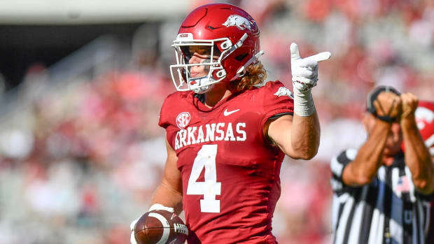 Razorbacks' wide receiver Isaac TeSlaa points first down against Kent State