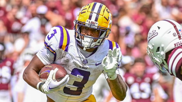LSU's Justin Robinson makes a move on a Mississippi State defensive back