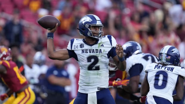 Sep 2, 2023; Los Angeles, California, USA; Nevada Wolf Pack quarterback Brendon Lewis (2) throws the ball against the Southern California Trojans in the first half at United Airlines Field at Los Angeles Memorial Coliseum. Mandatory Credit: Kirby Lee-USA TODAY Sports  