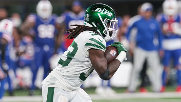 Jets' RB Dalvin Cook carries the ball vs. the Bills