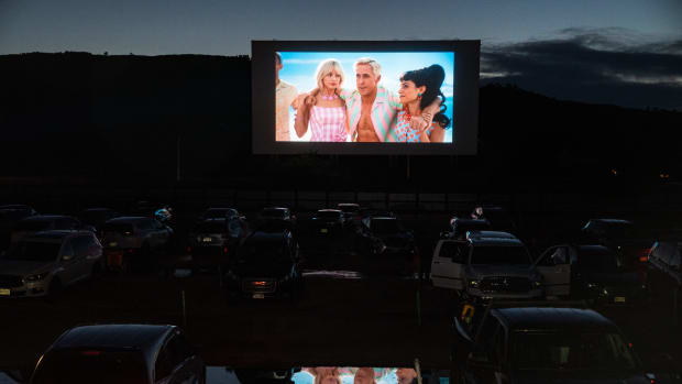 A preview for "Barbie" plays on a screen at the Holiday Twin Drive-In Move Theater in Fort Collins on Friday, July 21, 2023.