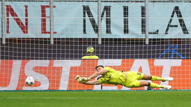 Goalkeeper Nick Pope pictured making one of EIGHT saves during Newcastle's 0-0 draw at AC Milan in the UEFA Champions League in September 2023
