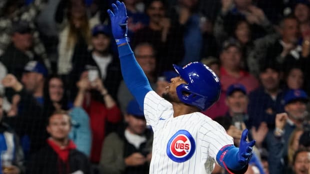 Sep 19, 2023; Chicago, Illinois, USA; Chicago Cubs designated hitter Alexander Canario (4) gestures after hitting a grand slam home run against the Pittsburgh Pirates during the eighth inning at Wrigley Field. Mandatory Credit: David Banks-USA TODAY Sports