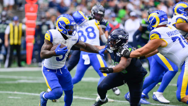 Sep 10, 2023; Seattle, Washington, USA; Los Angeles Rams running back Cam Akers (3) stiff arms Seattle Seahawks linebacker Uchenna Nwosu (10) during the second half at Lumen Field. Picture: Steven Bisig-USA TODAY Sports
