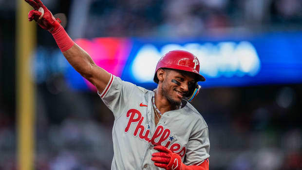 Sep 18, 2023; Cumberland, Georgia, USA; Philadelphia Phillies center fielder Johan Rojas (18) reacts after hitting a home run against the Atlanta Braves during the second inning at Truist Park. Mandatory Credit: Dale Zanine-USA TODAY Sports