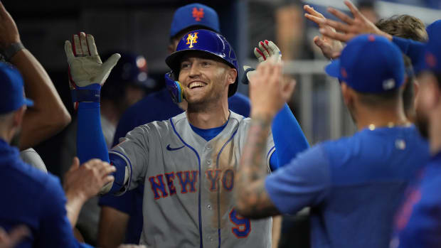 Sep 20, 2023; Miami, Florida, USA; New York Mets center fielder Brandon Nimmo (9) celebrates a home run in the ninth inning against the Miami Marlins at loanDepot Park.