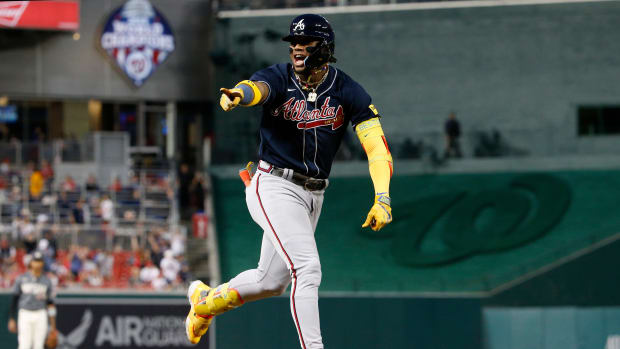 Sep 22, 2023; Washington, District of Columbia, USA; Atlanta Braves right fielder Ronald Acuna Jr. (13) celebrates while rounding the bases after hitting his 40th home run of the season against the Washington Nationals during the first inning at Nationals Park.