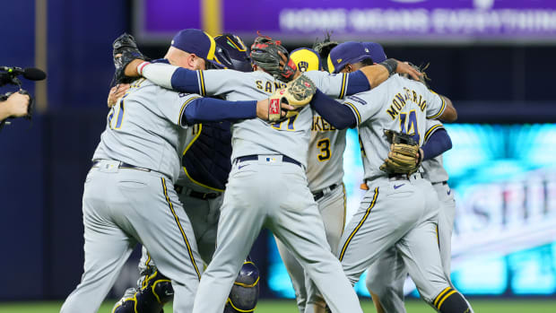 Sep 22, 2023; Miami, Florida, USA; Milwaukee Brewers players celebrate after winning the game against the Miami Marlins at loanDepot Park.
