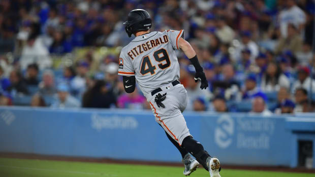 SF Giants center fielder Tyler Fitzgerald runs after hitting a double against the Los Angeles Dodgers during the seventh inning at Dodger Stadium on September 22, 2023.