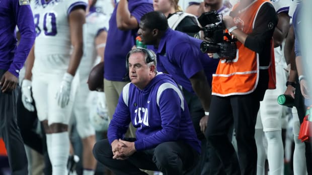 Dec 31, 2022; Glendale, Arizona, USA; TCU Horned Frogs head coach Sonny Dykes watches his team play the Michigan Wolverines in the second half of the 2022 Fiesta Bowl at State Farm Stadium. Mandatory Credit: Joe Camporeale-USA TODAY Sports  v