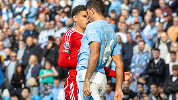 Manchester City midfielder Rodri pictured (right) going head to head with Nottingham Forest's Morgan Gibbs-White during a Premier League game in September 2023